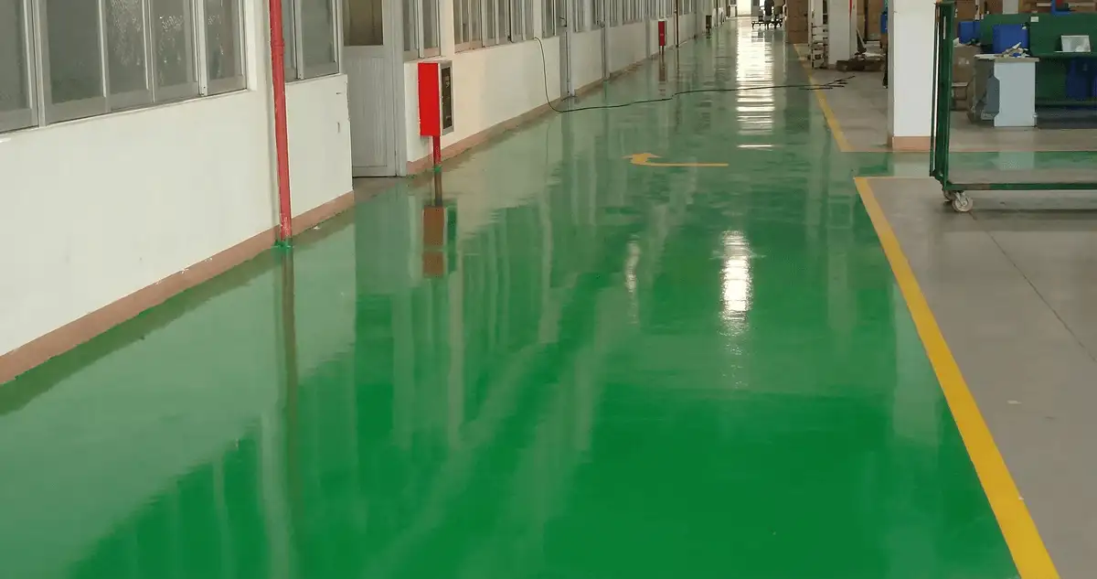 A factory floor professionally covered and marked with epoxy flooring in Denver, CO