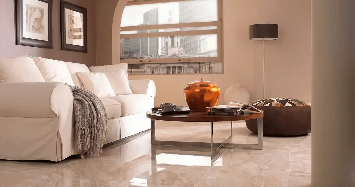 Modern living room with professionally installed marble flooring, a beige sofa, coffee table in Denver, CO